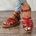 Roman style woven thick soled sandals for women with cross straps and beach sandals